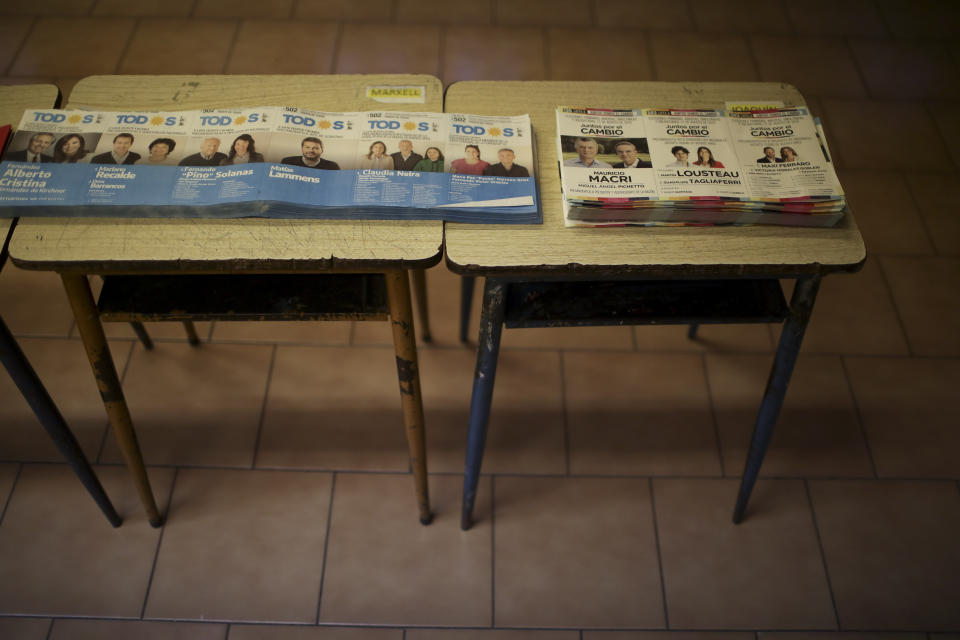 Voting ballots are set on a table at the dark room during primary elections in Buenos Aires, Argentina, Sunday, Aug. 11, 2019. Argentina is holding primary elections Sunday which are expected to provide a hint of who might win ahead of October's presidential elections. (AP Photo/Natacha Pisarenko)