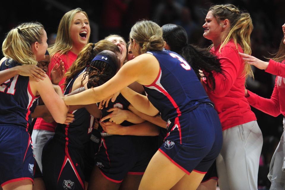 Belmont celebrates after upsetting No. 5 Oregon in the first round Saturday.