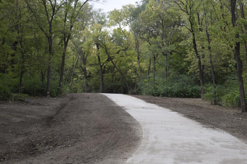 A new half-mile trail section behind the Salina Family YMCA has recently been completed. The trail section, which is having a ribbon-cutting ceremony on Oct. 28, is one of the first pieces completed as part of the Smoky Hill River Renewal project.