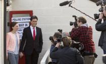 Ed Miliband, (2nd L) Leader of Britain's Labour Party, and his wife Justine Thornton, leave after casting their votes in the village of Sutton, England on May 7, 2015, as Britain holds a general election