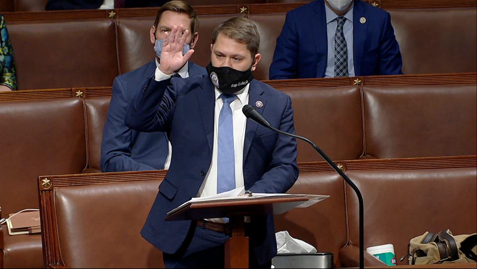 Rep. Ruben Gallego, D-Ariz., speaks as the House reconvenes to debate the objection to confirm the Electoral College vote from Arizona, after protesters stormed into the U.S. Capitol on Wednesday, Jan. 6, 2021.