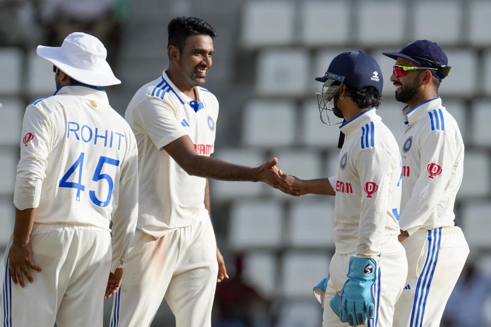 India's bowler Ravichandran Ashwin greets teammates after defeating West Indies for an innings and 141 runs on day three of their first cricket Test match at Windsor Park in Roseau, Dominica, Friday, July 14, 2023. (AP Photo/Ricardo Mazalan)