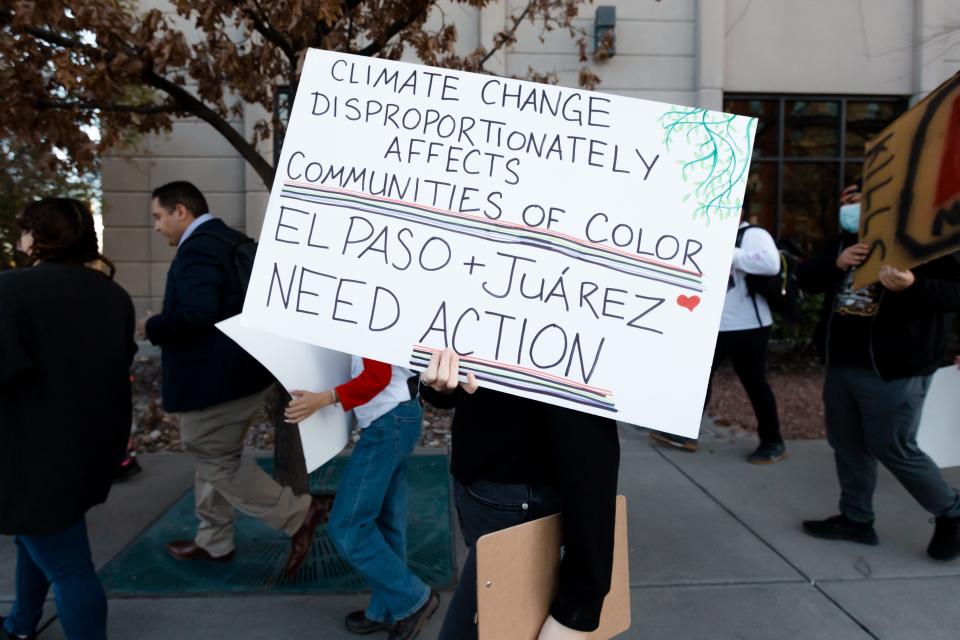 Protesters march around the Texas Commission on Environmental Quality office in El Paso to demand that the agency take action on air pollution on Feb. 10.