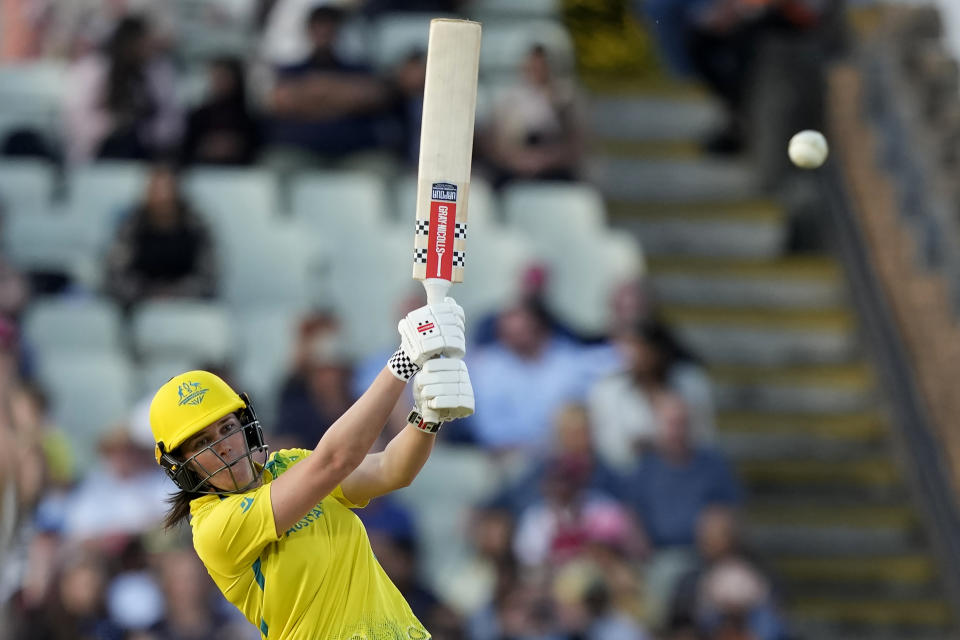 Australia's Tahlia McGrath hits a boundary during the women's cricket T20 semifinal match between Australia and New Zealand at Edgbaston at the Commonwealth Games in Birmingham, England, Saturday, Aug. 6, 2022. (AP Photo/Aijaz Rahi)