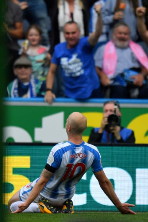 Huddersfield Town's midfielder Aaron Mooy celebrates scoring against Newcastle United on August 20, 2017