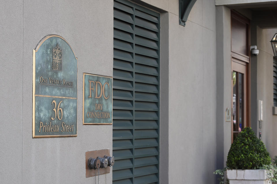 This photo shows the outside of a Charleston, S.C., condominium belonging to Eugene Zurlo on Monday, Oct. 19, 2020. The Trump administration recently gave the longtime Republican political donor seed money to test a possible COVID-19-fighting blood plasma technology, noting Zurlo's "manufacturing facilities" in Charleston. An AP investigation found no manufacturing facilities. The company operates out of Zurlo's condo. He and his partners may now be in line for as much as $65 million in taxpayer money. (AP Photo/Meg Kinnard)