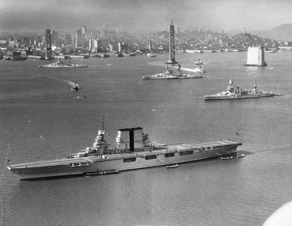 Black and white photo shows military ships in San Francisco Bay