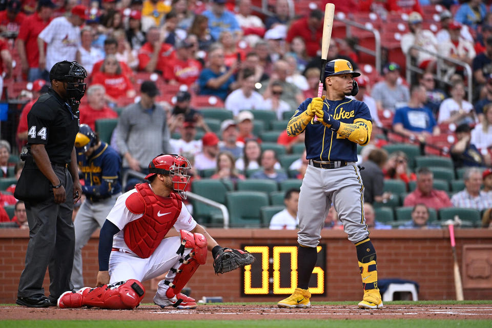 Willson Contreras #40 of the St. Louis Cardinals and William Contreras #24 of the Milwaukee Brewers