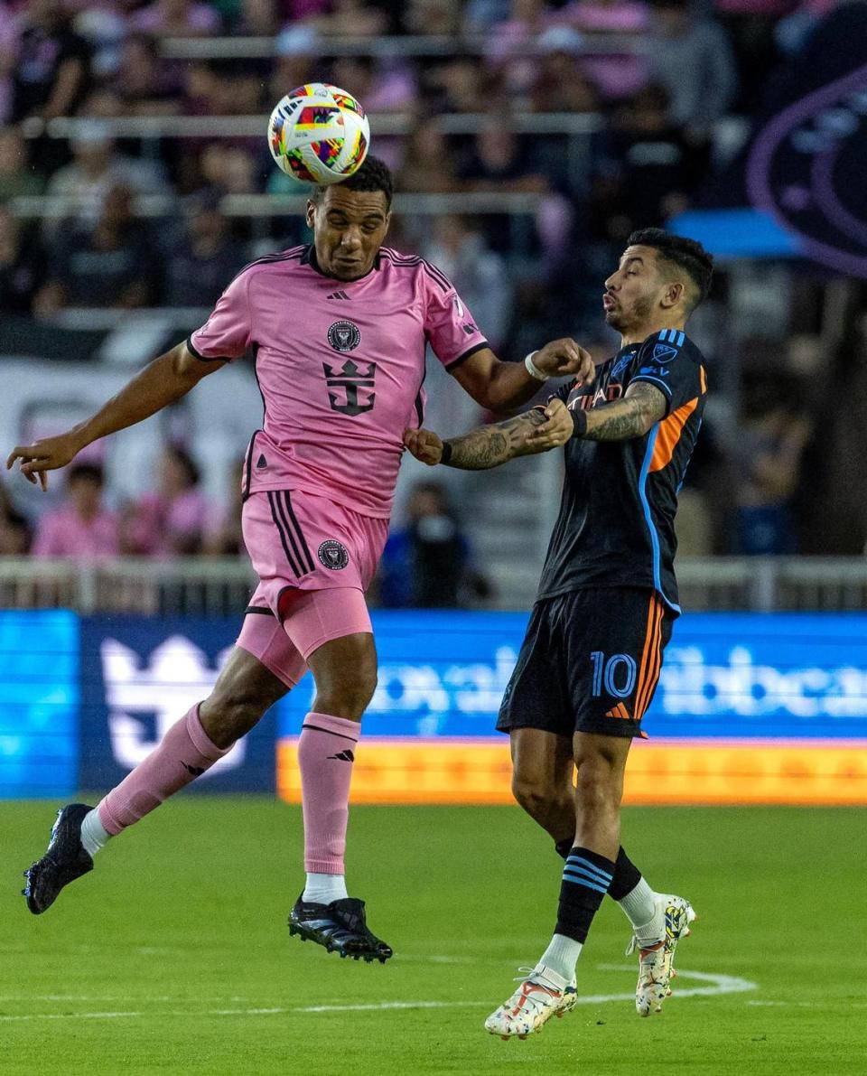 Inter Miami midfielder Yannick Bright heads the ball in front of New York City midfielder Santiago Rodríguez (10) in the first half of an MLS match at Chase Stadium on Saturday, March 30, 2024, in Fort Lauderdale, Fla.