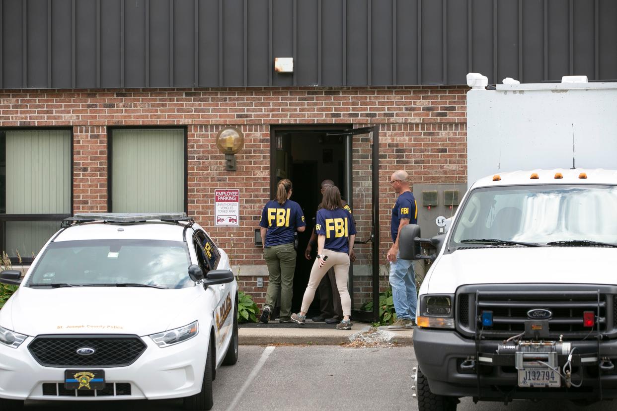 FBI agents raid the Housing Authority of South Bend offices on July 31, 2019. Federal prosecutors charged six individuals in the case, including former executive director Tonya Robinson.
(Credit: Tribune Photo/SANTIAGO FLORES, South Bend Tribune)