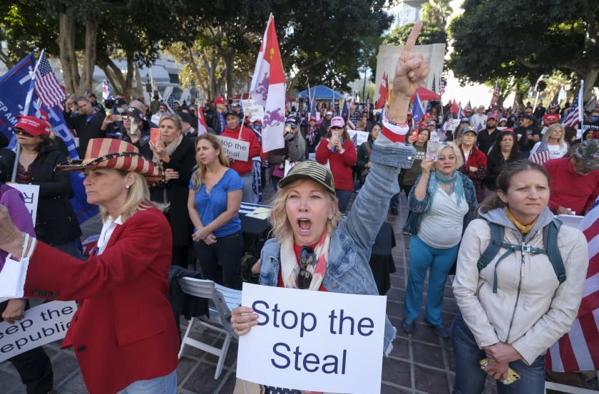 Supporters of US President Donald Trump protest in Los Angeles, California, on January 6, 2021. - Trump supporters, fueled by his spurious claims of voter fraud, are protesting the expected certification of Joe Biden's White House victory by the US Congress on January 6. (Photo by RINGO CHIU / AFP) (Photo by RINGO CHIU/AFP via Getty Images)