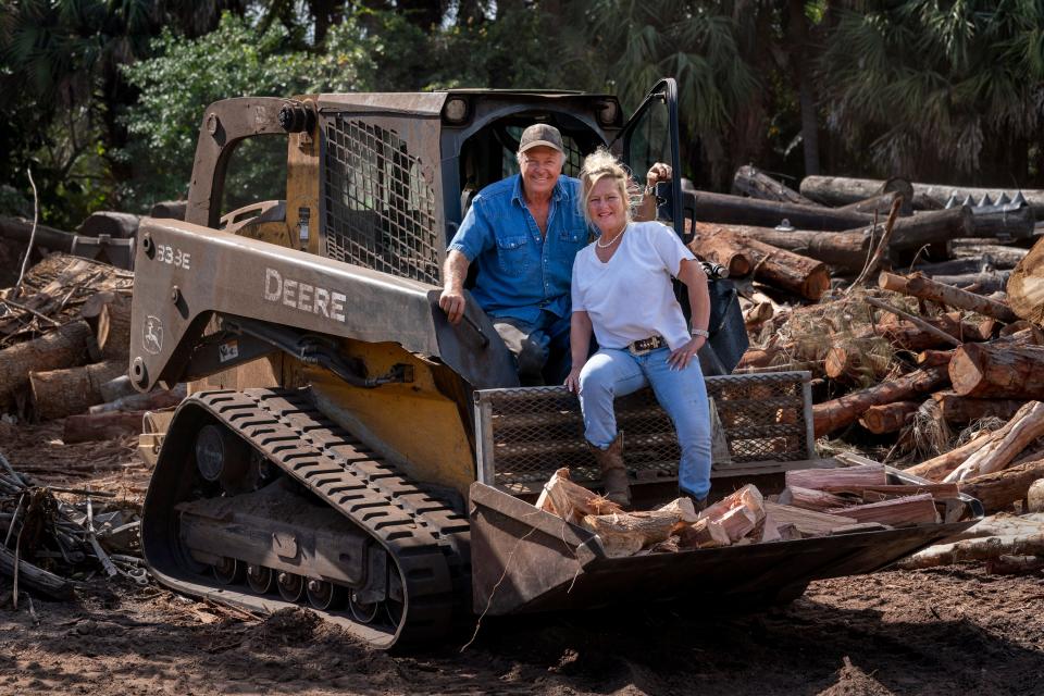 Mike and Sheryl Brosseit at Sheryl's Firewood in West Palm Beach, Florida on February 1, 2021. GREG LOVETT/PALMBEACHPOST