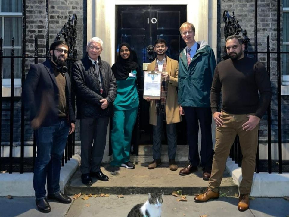 MP Stephen Timms, Lord John Sharkey and Muslim representatives and campaigners visit 10 Downing Street in call of interest-free student loans. (Sadiq Dorasat/The Independent)