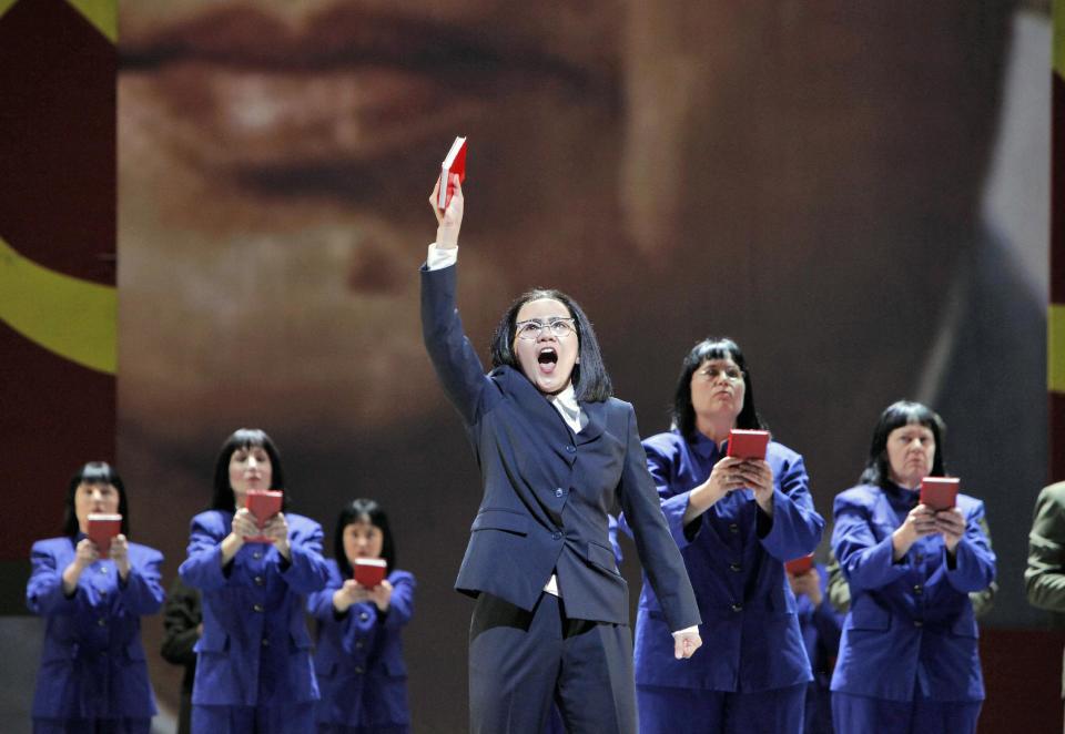 In this June 5, 2012 handout photo provided by the San Francisco Opera, Hye Jung Lee, as Madame Mao, sings “I am the Wife of Mao Tse-tung” during a scene from the final dress rehearsal of "Nixon in China." The production, increasingly recognized as a modern masterpiece, is finally getting the recognition it deserves on the home ground of composer John Adams, in a sparkling production that highlights the San Francisco Opera's summer season. (AP Photo/San Francisco Opera, Cory Weaver, handout)