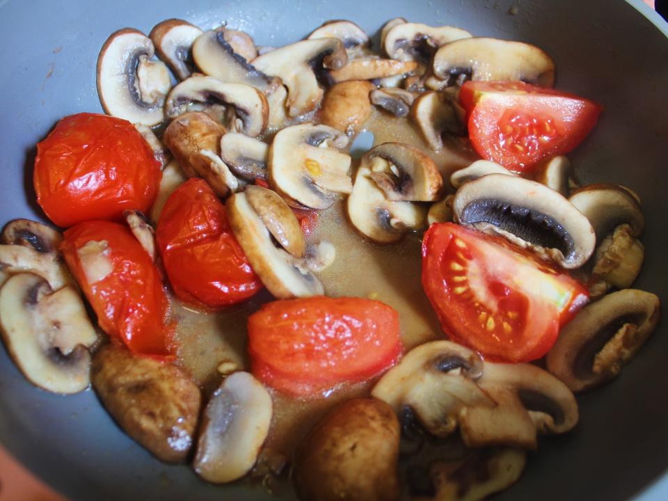 cooked mushrooms and tomatoes
