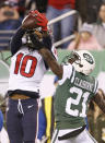 Houston Texans wide receiver DeAndre Hopkins (10) makes a touchdown catch on a pass from quarterback Deshaun Watson, not pictured, as New York Jets cornerback Morris Claiborne (21) defends during the second half of an NFL football game, Saturday, Dec. 15, 2018, in East Rutherford, N.J. The Texans won 29-22. (AP Photo/Adam Hunger)