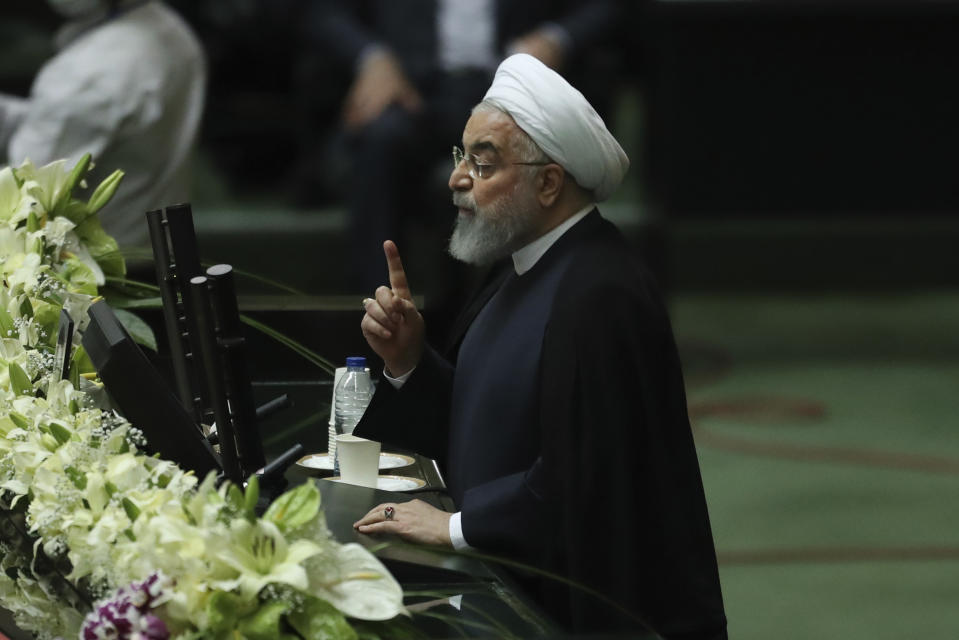 Iranian President Hassan Rouhani speaks during the inauguration of the new parliament in Tehran, Iran, Wednesday, May, 27, 2020. Iran has convened its newly elected parliament, dominated by conservative lawmakers and under strict social distancing regulations, as the country struggles to curb the spread of coronavirus that has hit the nation hard. Iran is grappling with one of the deadliest outbreaks in the Middle East. (AP Photo/Vahid Salemi)