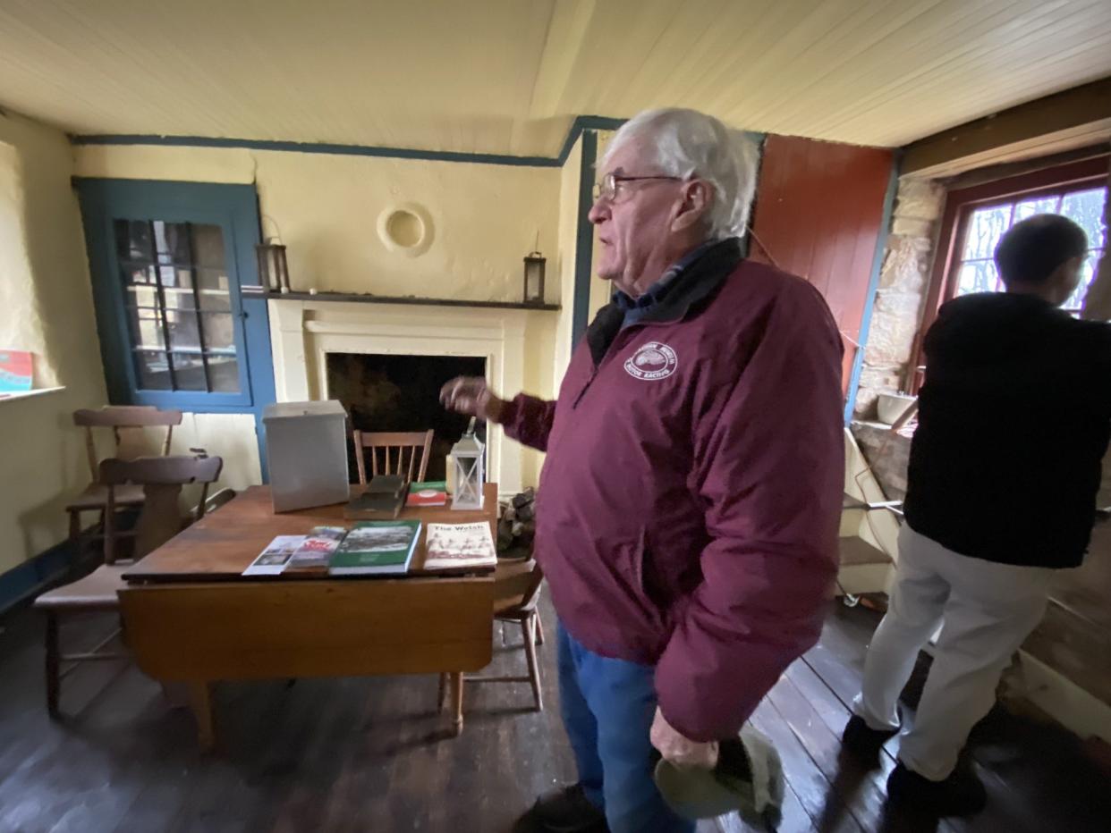 Old Line Museum’s Don Robinson gives a tour of one of the two Coulsontown Welsh quarrymen’s cottages undergoing renovations.