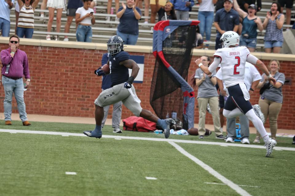 Georgia Southern linebacker Khadry Jackson returns an interception 43 yards for a touchdown to give the Eagles an early 7-0 lead on South Alabama on Saturday at Paulson Stadium in Statesboro.
