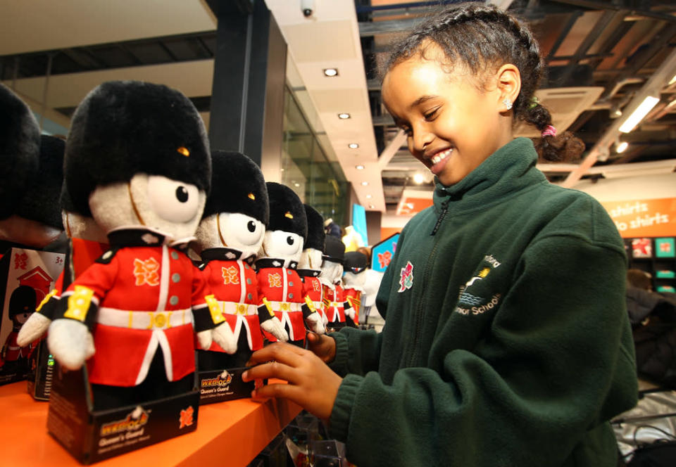 A school girl from Cranford Primary School checks out the merchandise inside the new London 2012 store during the London 2012 Shop Opening At Heathrow Terminal 5 at Heathrow Airport on March 1, 2011 in London, England. (Photo by Julian Finney/Getty Images for LOCOG)