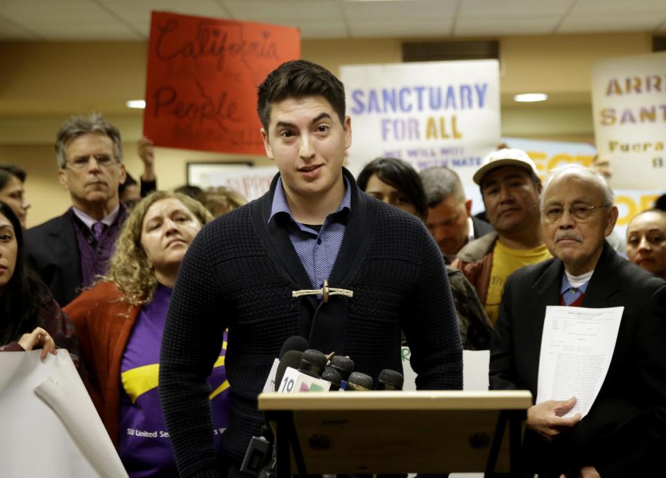 Victor Alvarez, discusses the hardships to his family after his father was deported by immigration authorities last February, during a news conference, Tuesday, Jan. 31, 2017, in Sacramento, Calif. Alvarez testified in support of SB54, by state Senate President Pro Tem Kevin de Leon, D-Los Angeles, that would prohibit local law enforcement from cooperating with federal immigration authorities. The committee passed de Leon's bill, that if approved by the Legislature and signed by the governor, could create a border-to-border sanctuary in the nation's largest state. (AP Photo/Rich Pedroncelli)