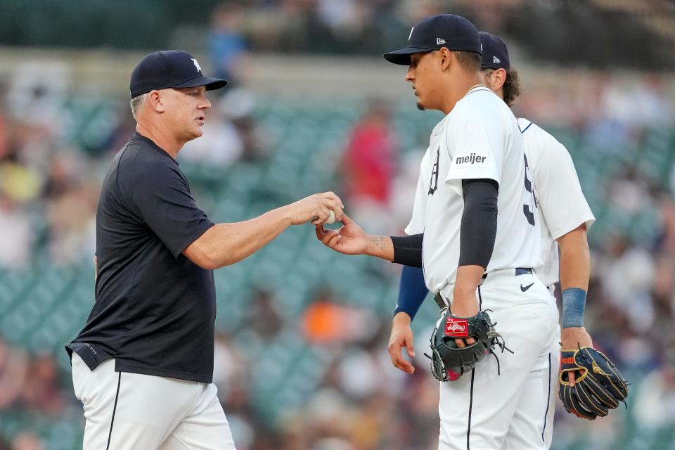 Keider Montero hands the ball to manager A.J. Hinch as he is replaced by Tyler Holton of the Detroit Tigers during the top of the seventh inning at Comerica Park in Detroit on Monday, July 8, 2024.