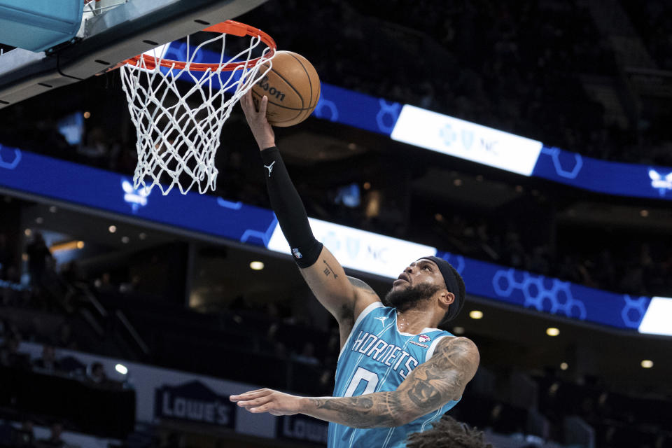 Charlotte Hornets forward Miles Bridges drives to the basket during the first half of an NBA basketball game against the New York Knicks, Monday, Jan. 29, 2024, in Charlotte, N.C. (AP Photo/Jacob Kupferman)