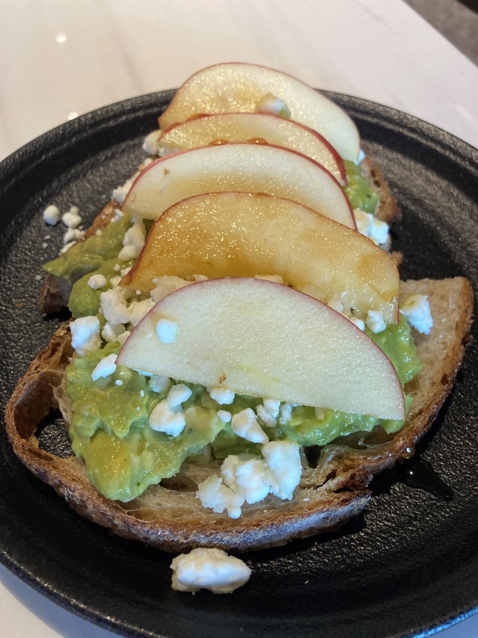 Avocado toast with apples, goat cheese and honey at The Granola Bar in Rye. Photographed Jan. 18, 2023.