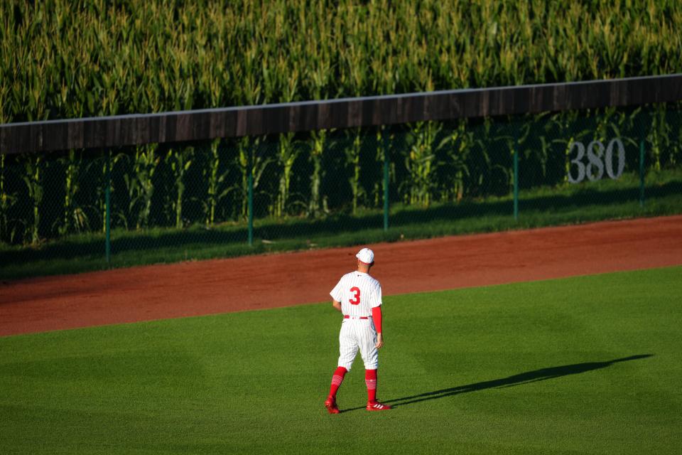 Cincinnati Reds right fielder Albert Almora Jr. (3) looks out into the cornfields in left field doing the second inning of a baseball gam against the Chicago Cubs, Thursday, Aug. 11, 2022, at the MLB Field of Dreams stadium in Dyersville, Iowa. 