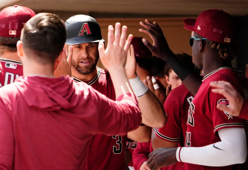 Mar 23, 2023; Scottsdale, AZ, USA; Arizona Diamondbacks Evan Longoria (3) reacts after scoring against the Los Angeles Dodgers in the first inning during a spring training game at Salt River Fields. Mandatory Credit: Rob Schumacher-Arizona Republic