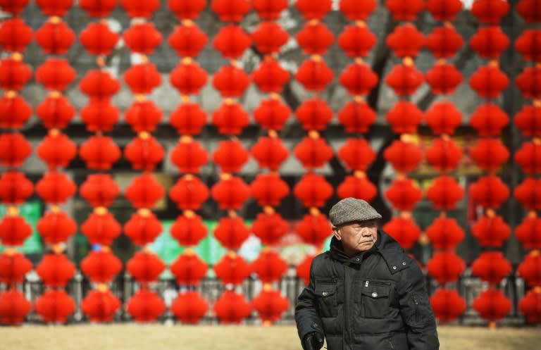 In China, elderly family members traditionally give children red envelopes of cash, known as lucky money, during the Lunar New Year holiday to wish them good fortune in the coming year