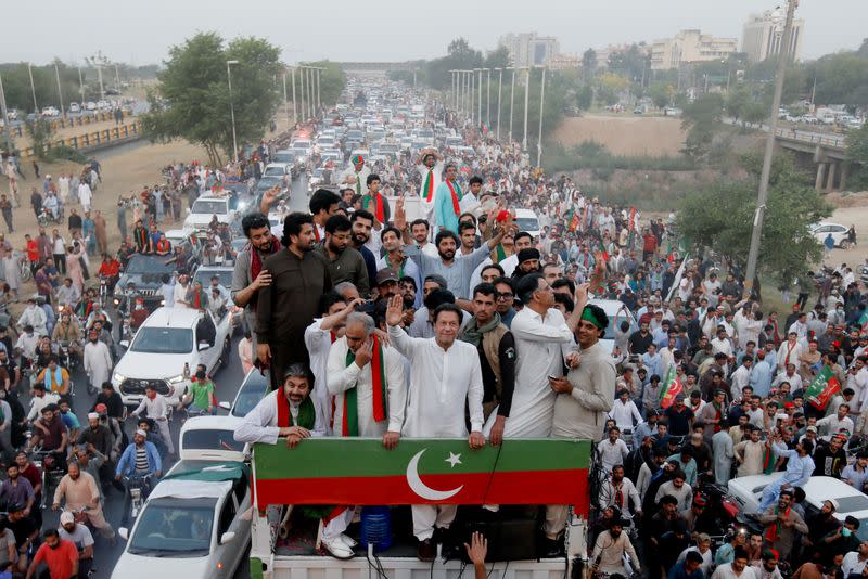 FILE PHOTO: Ousted Pakistani Prime Minister Imran Khan gestures as he leads a protest march in Islamabad