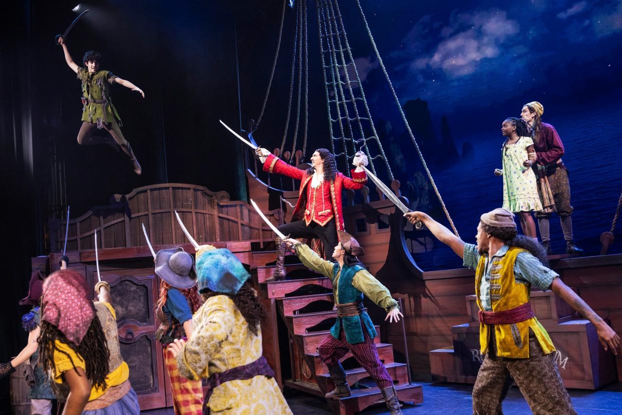 From left, Nolan Almeida stars as Peter Pan, Cody Garcia as Captain Hook, Hawa Kamara as Wendy and the company perform in the new adaptation of the musical "Peter Pan."