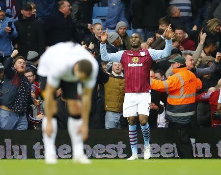 Aston Villa's Christian Benteke (R) celebrates after scoring a goal against Manchester United during their English Premier League soccer match at Villa Park in Birmingham, central England December 20, 2014. REUTERS/Darren Staples