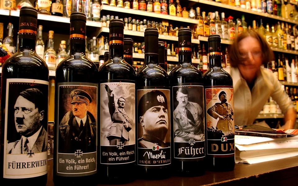 It is not uncommon to find wine decorated with images of Hitler and Mussolini in Italian off-licences - Getty