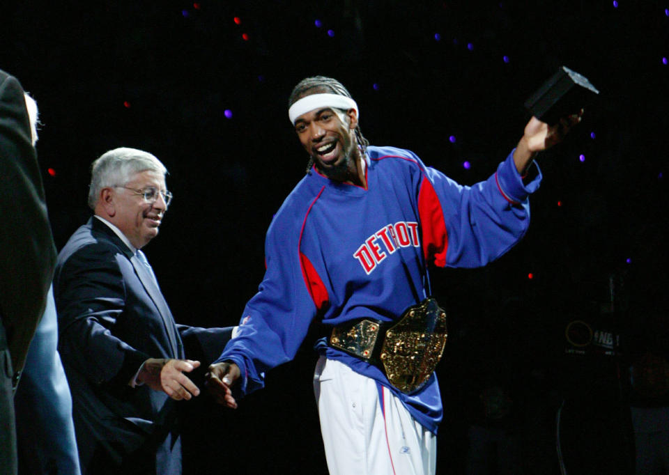 Richard Hamilton models his championship belt with then-NBA commissioner David Stern. (Getty Images)