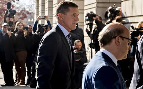 Michael Flynn, the former US national security advisor, center, arrives at the U.S. Courthouse in Washington, D.C - Credit: Andrew Harrer/Bloomberg