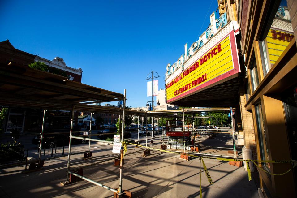 The marquee at the Englert Theatre reads, "Closed until further notice," and "Celebrate Pride!" as construction continues during a renovation project, Friday, June 12, 2020, in Iowa City, Iowa.