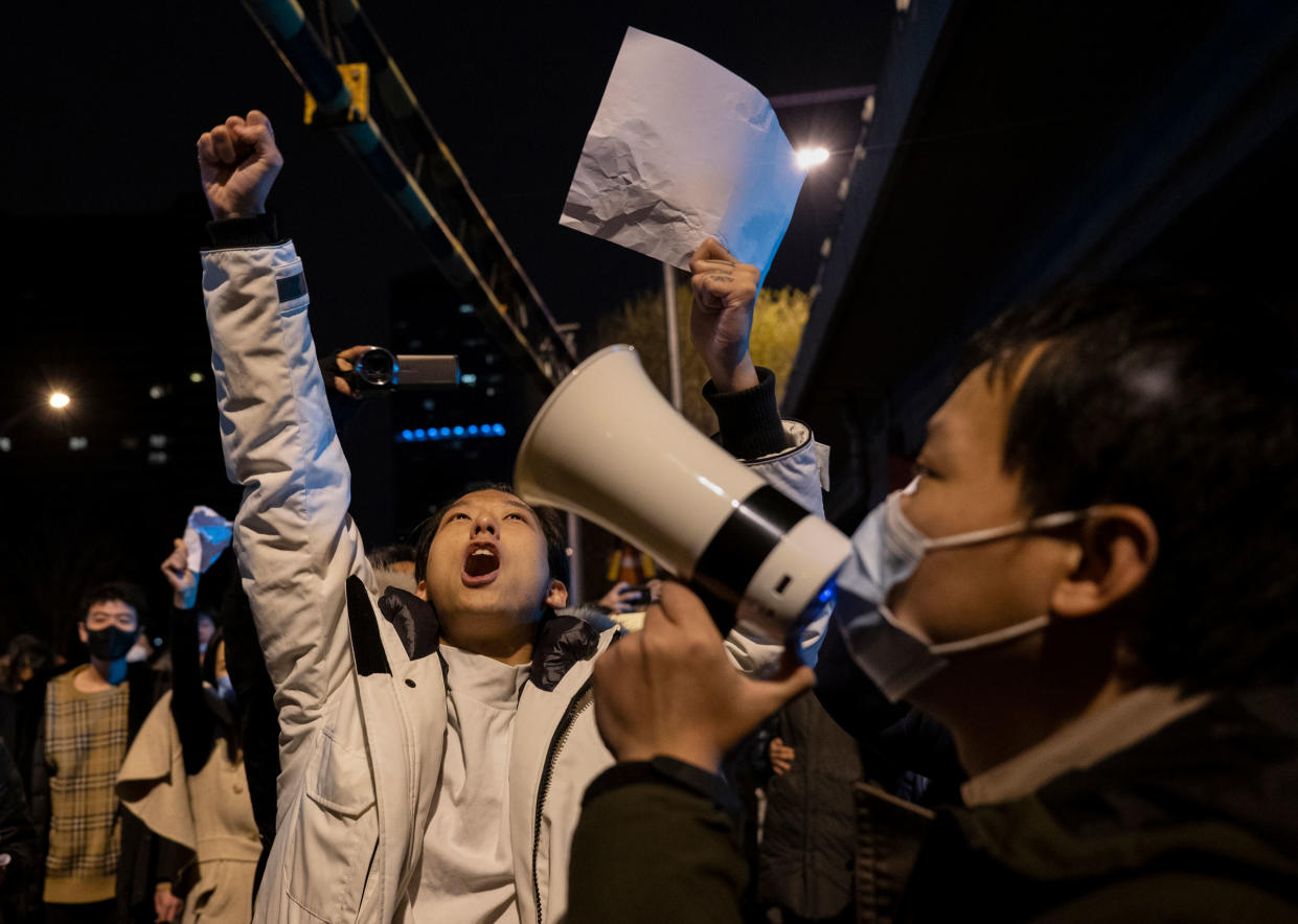 Protesters shout slogans during a protest against Chinas strict zero COVID measures on Nov. 28, 2022 in Beijing, China.