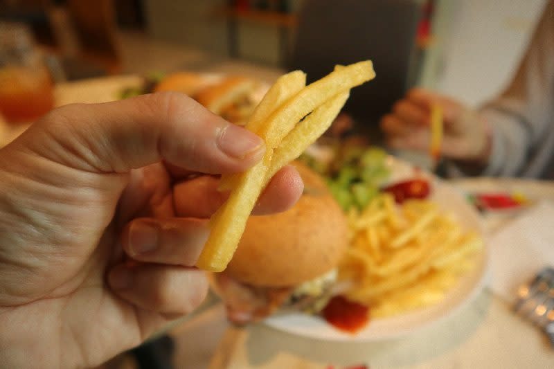 two blur guys - closeup of fries