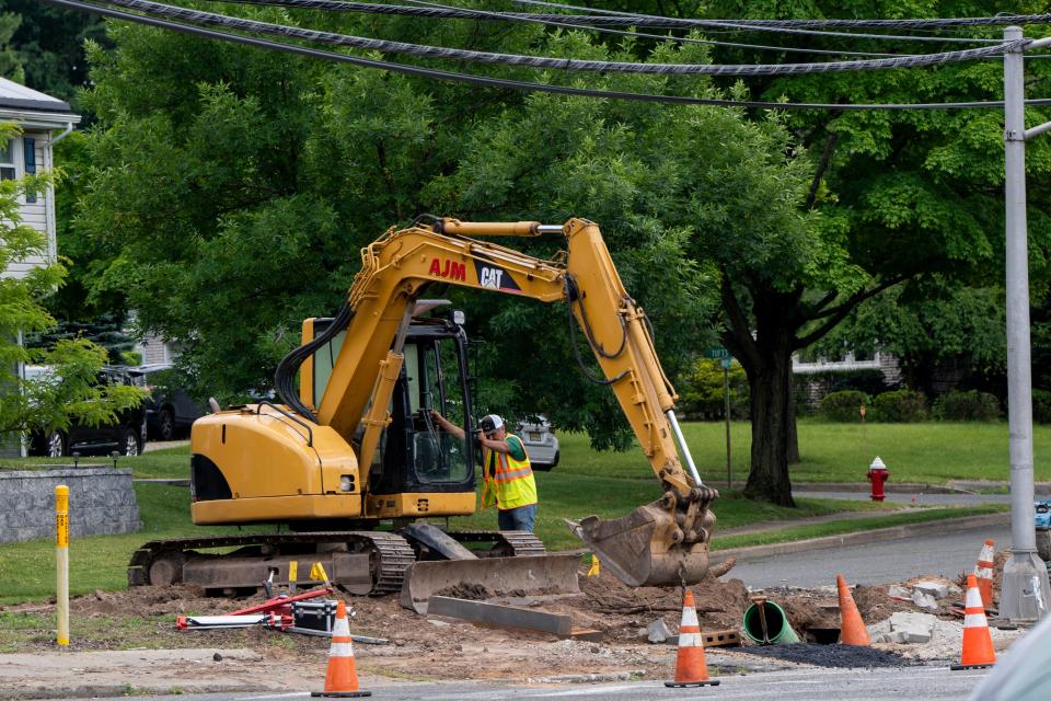 Jun 12, 2024; Paramus, NJ; Workers begin improvements at the intersection of Forest Avenue and Spring Valley Road on Wednesday afternoon.