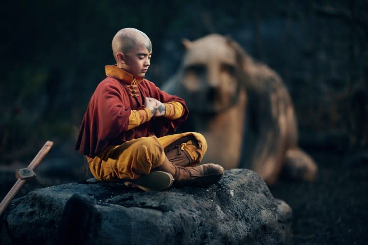 Aang meditates on a rock in Avatar: The Last Airbender.