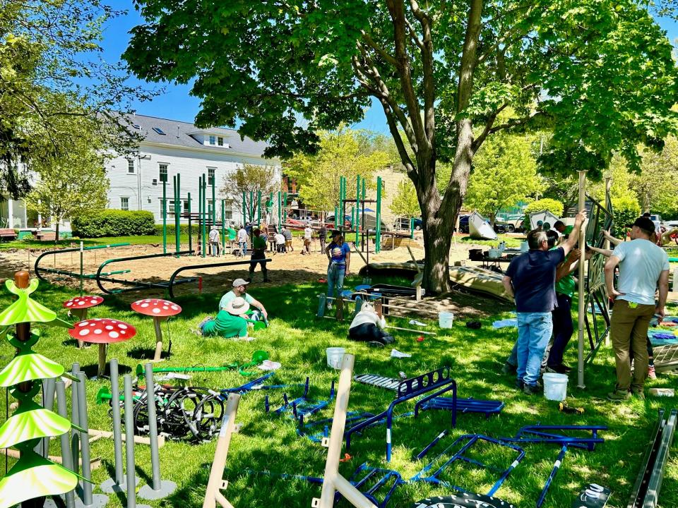 The community build of a new playground in Saugatuck is underway Tuesday, May 7.