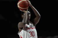 Japan's Evelyn Mawuli (30) carries the ball during women's basketball preliminary round game against France at the 2020 Summer Olympics, Tuesday, July 27, 2021, in Saitama, Japan. (AP Photo/Eric Gay)