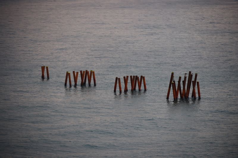Steel frames are seen in the sea off erosion-affected Maengbang beach, in Samcheok