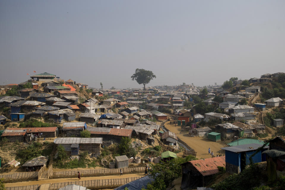 FILE - A Nov. 17, 2018 file photo of Balukhali refugee camp near Cox's Bazar, in Bangladesh. A Cabinet minister says authorities in Bangladesh will build barbed-wire fences around sprawling camps housing Rohingya refugees to stop their expansion. (AP Photo/Dar Yasin, File)