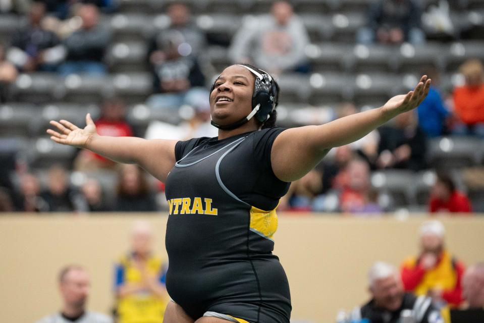 Central’s Faith Allen celebrates her semifinal win over Boyd County’s Destiny Jackson on Saturday in Lexington. Allen went on to win the state title at 235.