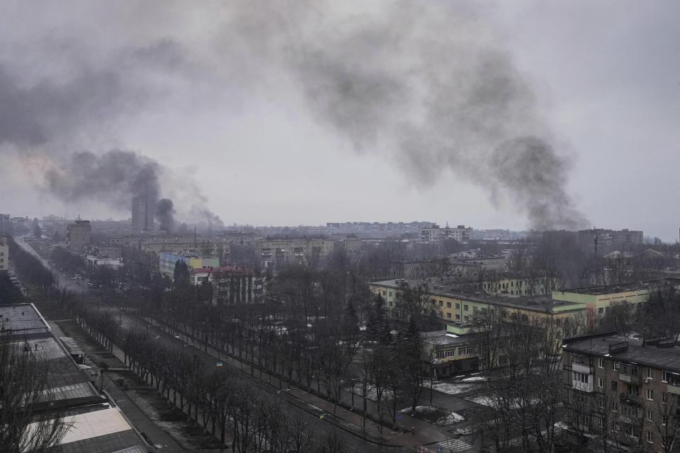 Smoke rises after shelling in Mariupol, Ukraine, Wednesday, March 9, 2022. (AP Photo/Evgeniy Maloletka)