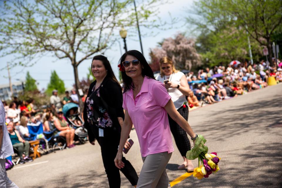 Michigan Attorney General Dana Nessel walks the parade route of the Tulip Time Kinder/Middle Parade Thursday, May 12, 2022, in downtown Holland. 