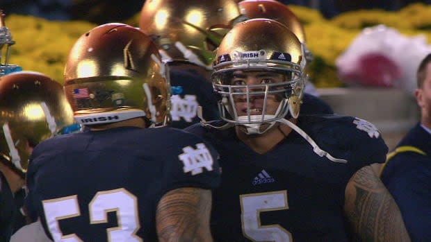 Manti Te'o plays for Notre Dame in college in a scene from the Netflix documentary "Untold: The Girlfriend Who Didn't Exist."<p>Courtesy of Netflix</p>